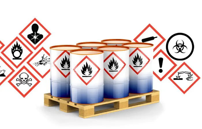 Drums with WHMIS hazardous symbols